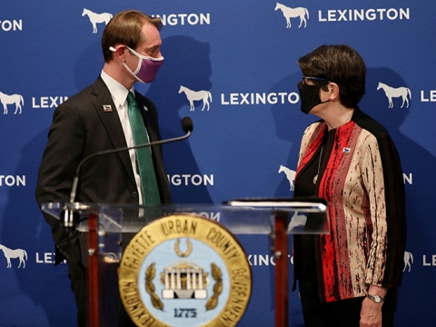 Secretary of State Michael Adams and Mayor Linda Gorton speak at a news conference.