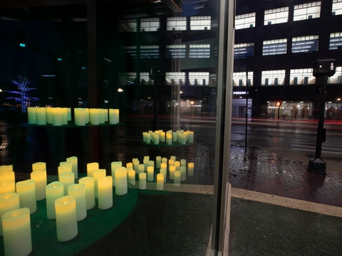 Lit candles at the Pam Miller Downtown Art Center