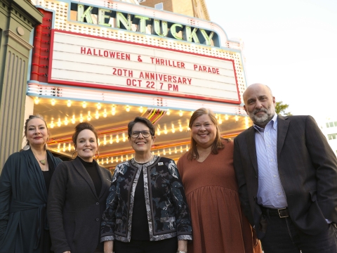 Mayor Linda Gorton with representatives from Mecca Dance, Lexington Parks & Recreation and the Kentucky Theatre standing in front of the theater's marquee