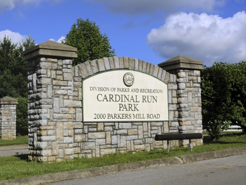 Monument sign that reads Cardinal Run Park